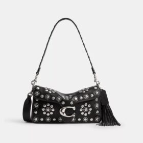 Tabby skuldertaske 26 med western-nitter