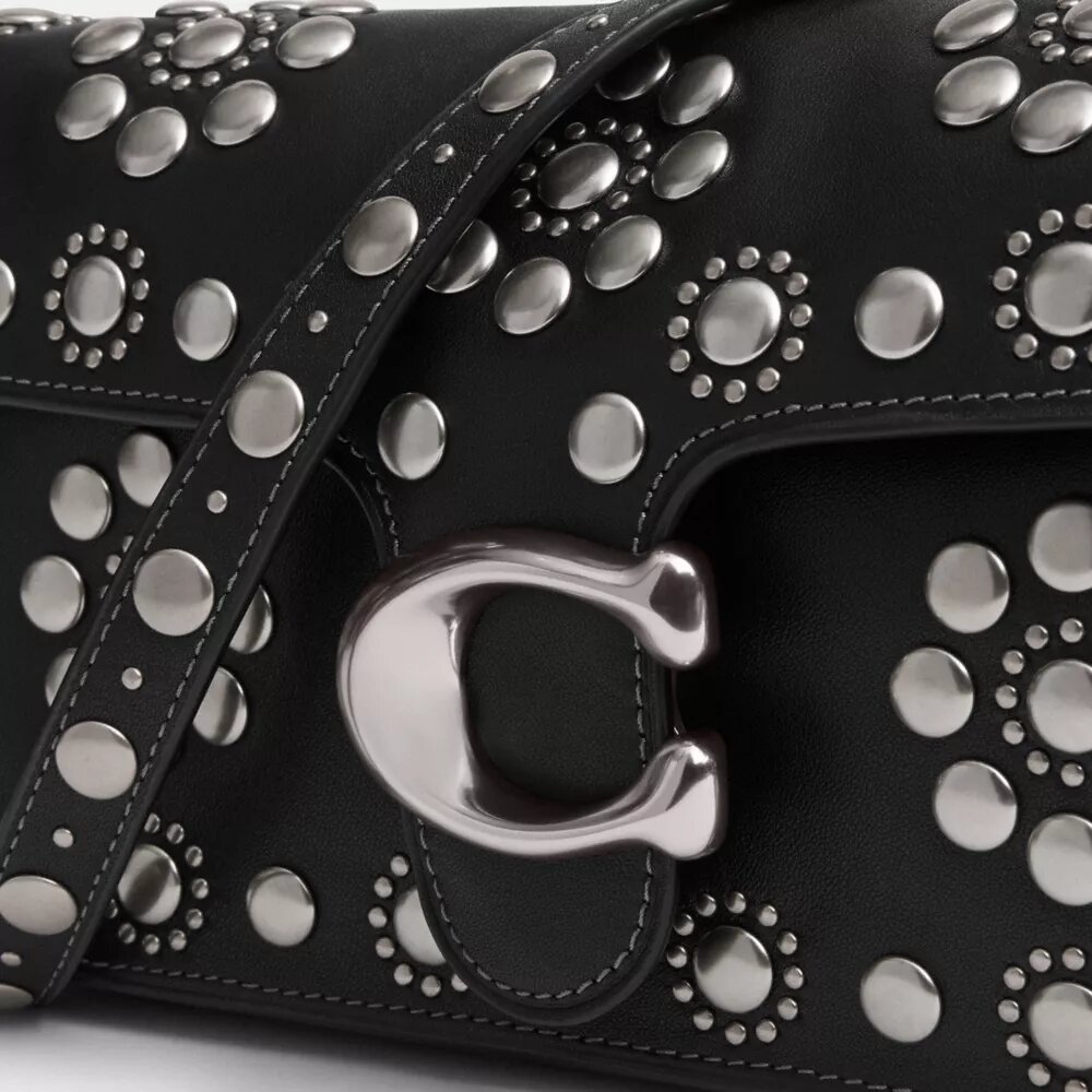 Tabby skuldertaske 26 med western-nitter