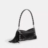 Tabby skuldertaske 26 med western-nitter