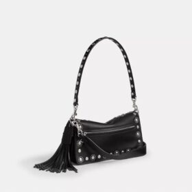 Tabby skuldertaske 26 med western-nitter
