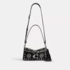 Tabby skuldertaske 26 med western-nitter