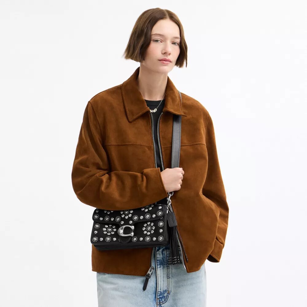 Tabby skuldertaske 26 med western-nitter