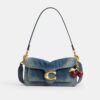 Tabby skuldertaske i 26 i regenerativ bomuldsdenim