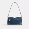 Tabby skuldertaske i 26 i regenerativ bomuldsdenim