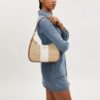 Teri Hobo-taske i Signature Canvas med striber