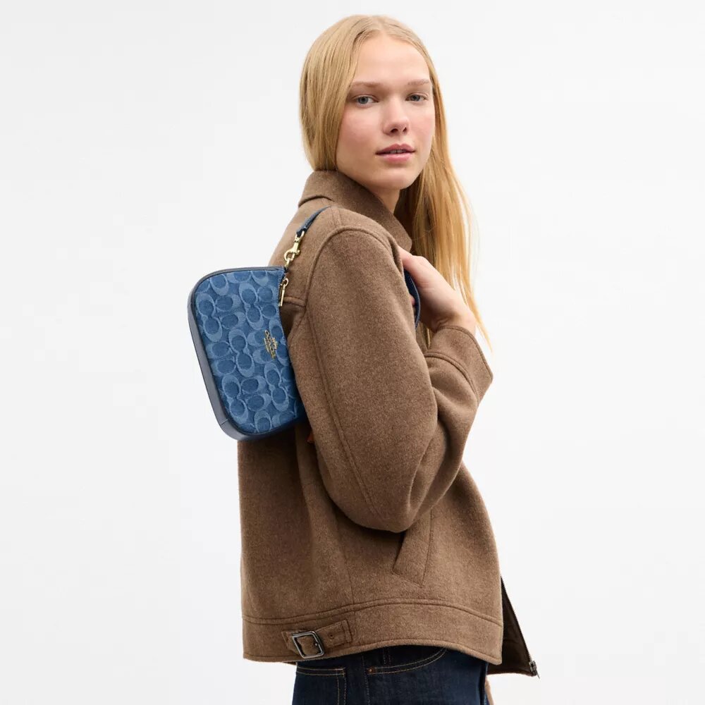 Teri Mini-crossbody-taske i signaturdenim