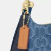 Teri Mini-crossbody-taske i signaturdenim