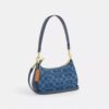Teri Mini-crossbody-taske i signaturdenim