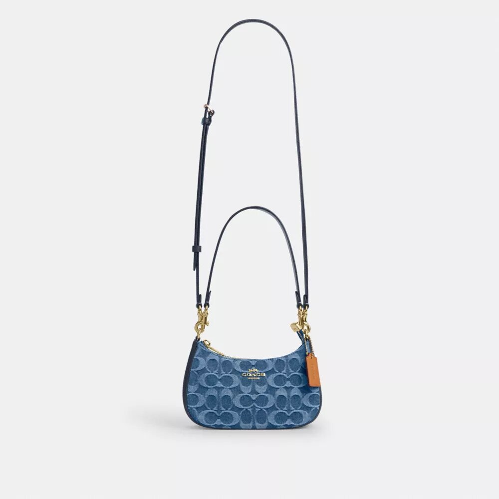 Teri Mini-crossbody-taske i signaturdenim