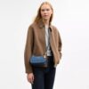 Teri Mini-crossbody-taske i signaturdenim