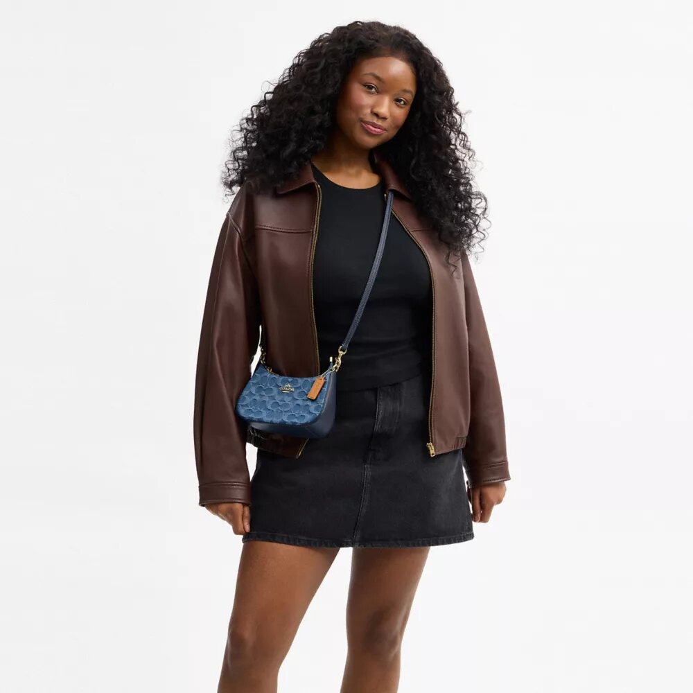 Teri Mini-crossbody-taske i signaturdenim