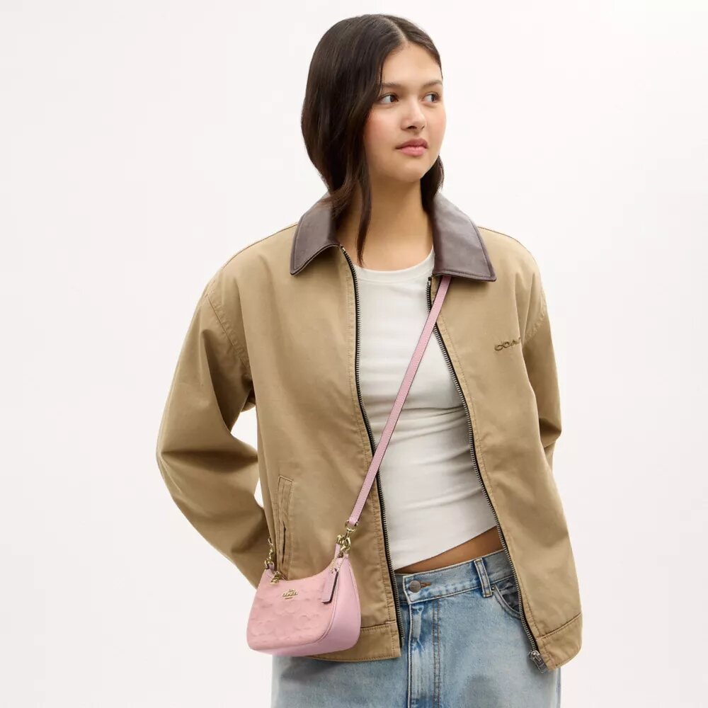 Teri Mini-crossbody-taske i signaturdenim