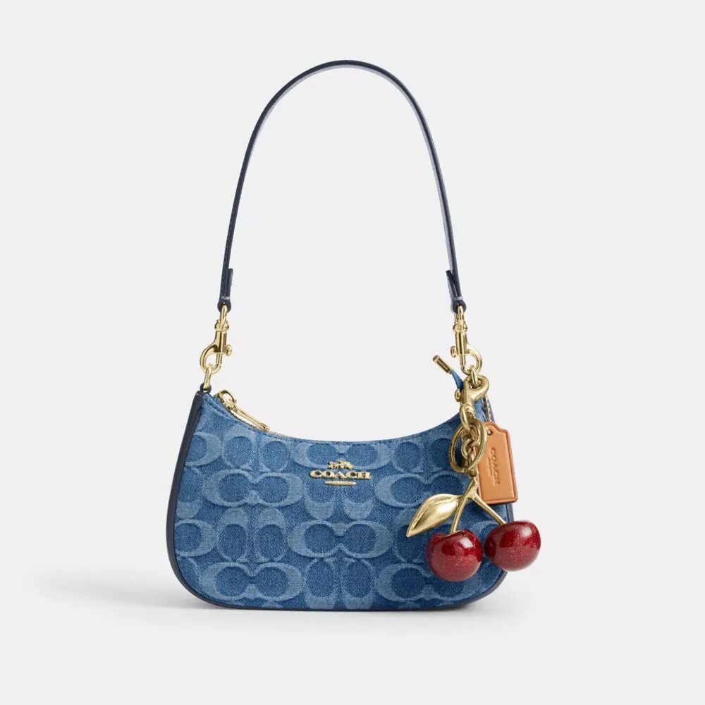 Teri Mini-crossbody-taske i signaturdenim