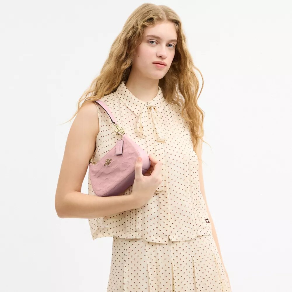 Teri Mini-crossbody-taske i signaturdenim
