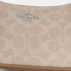 Teri Mini-crossbody-taske i Signature Canvas