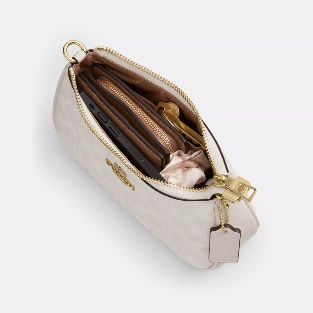 Teri Mini-crossbody-taske i Signature Canvas