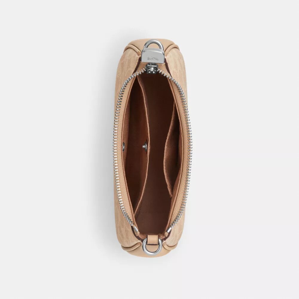 Teri Mini-crossbody-taske i Signature Canvas