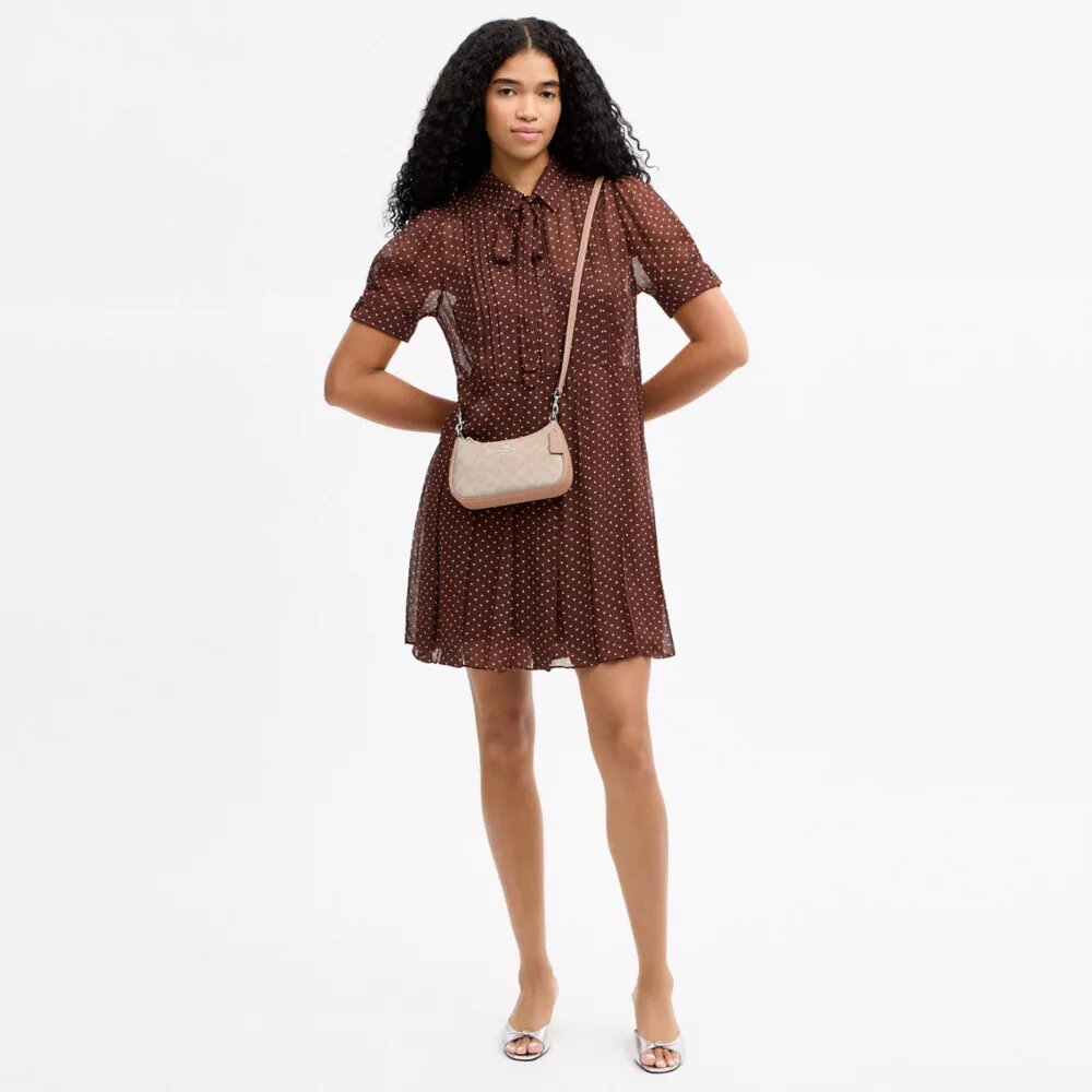 Teri Mini-crossbody-taske i Signature Canvas