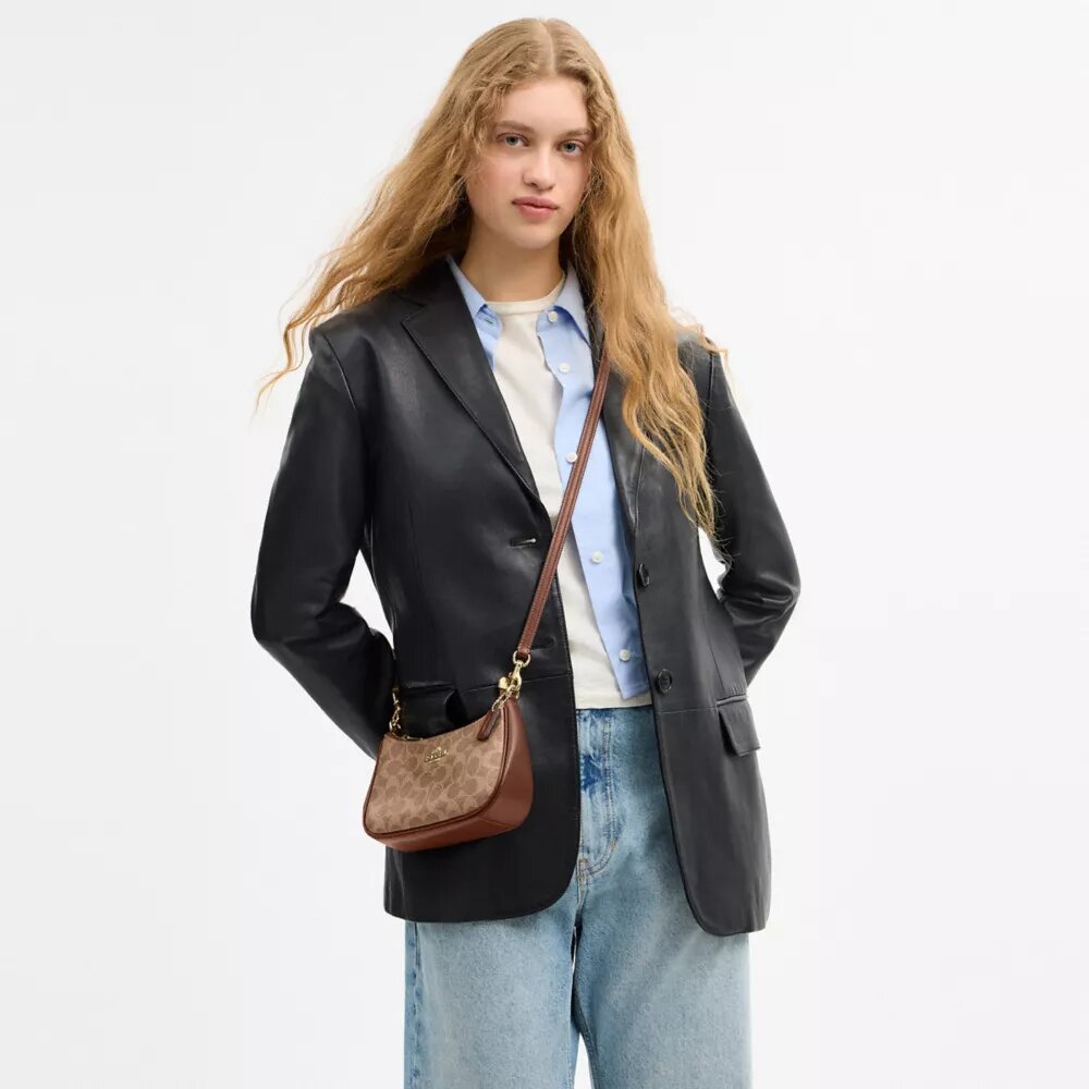 Teri Mini-crossbody-taske i Signature Canvas