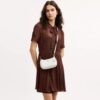 Teri Mini-crossbody-taske i Signature Canvas