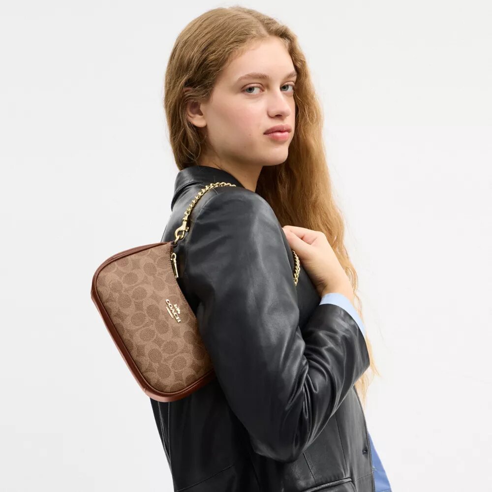 Teri Mini-crossbody-taske i Signature Canvas
