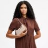 Teri Mini-crossbody-taske i Signature Canvas