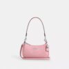 Teri Mini-crossbody-taske i signaturlæder med hjertevedhæng