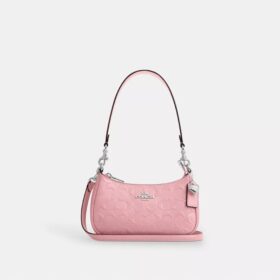 Teri Mini-crossbody-taske i signaturlæder med hjertevedhæng