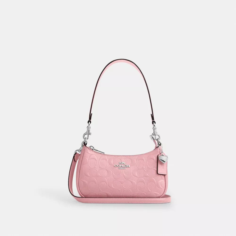 Teri Mini-crossbody-taske i signaturlæder med hjertevedhæng