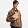 Teri Mini-crossbody-taske i signaturlæder med hjertevedhæng