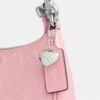 Teri Mini-crossbody-taske i signaturlæder med hjertevedhæng
