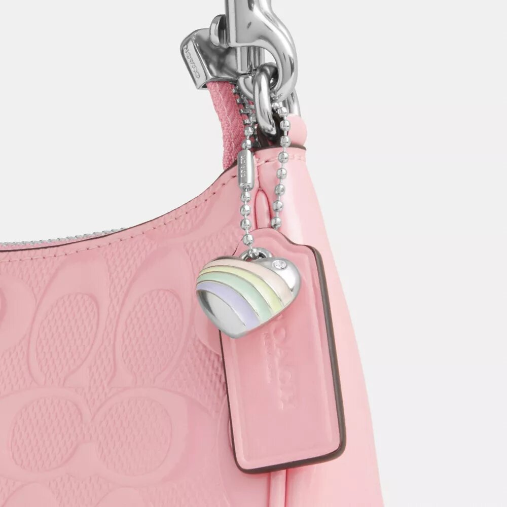 Teri Mini-crossbody-taske i signaturlæder med hjertevedhæng