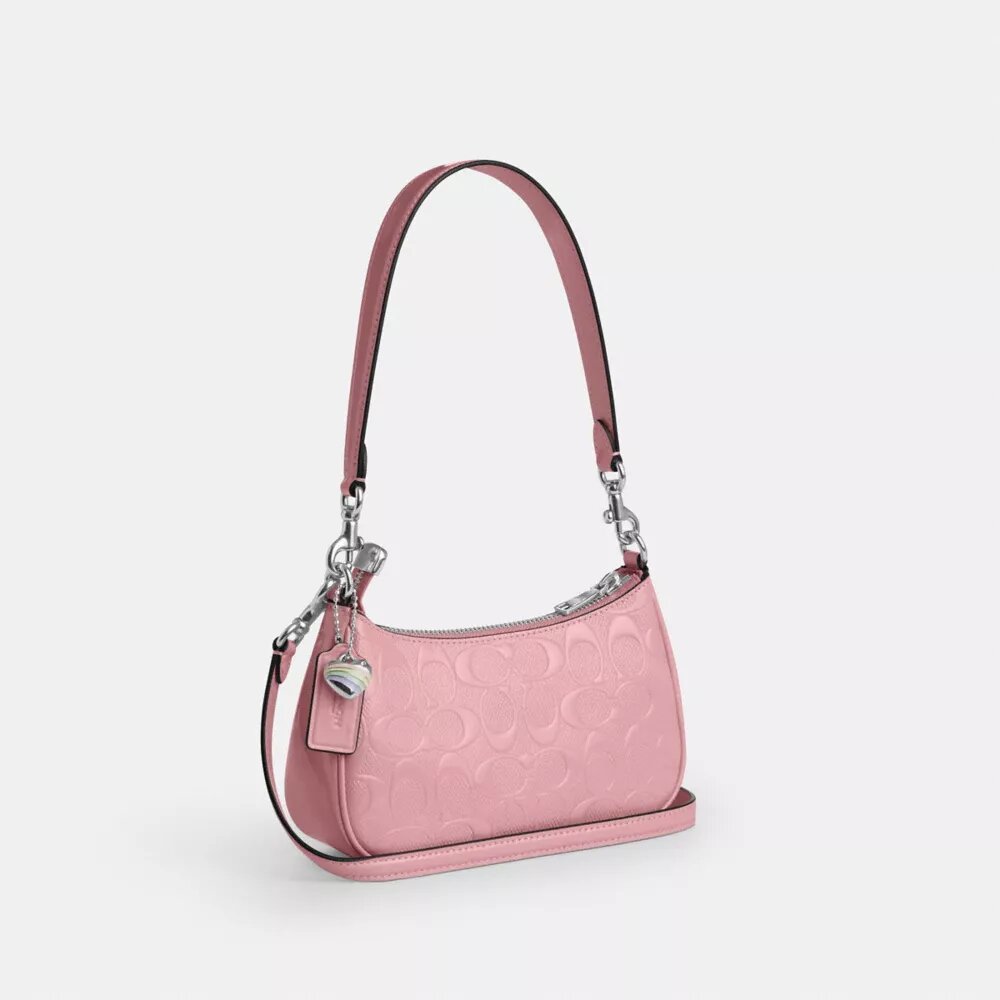Teri Mini-crossbody-taske i signaturlæder med hjertevedhæng