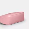 Teri Mini-crossbody-taske i signaturlæder med hjertevedhæng