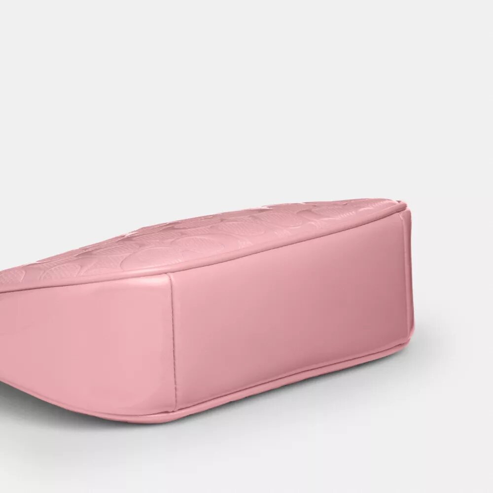 Teri Mini-crossbody-taske i signaturlæder med hjertevedhæng