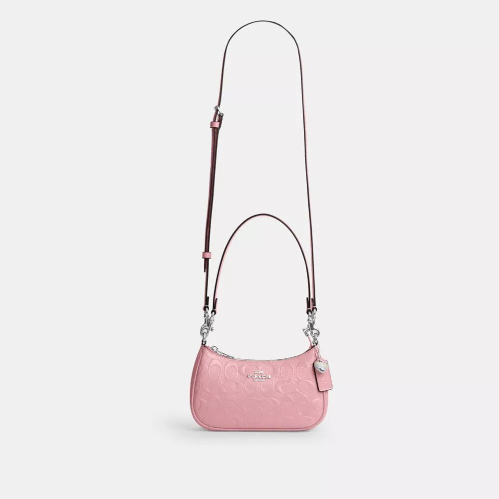 Teri Mini-crossbody-taske i signaturlæder med hjertevedhæng