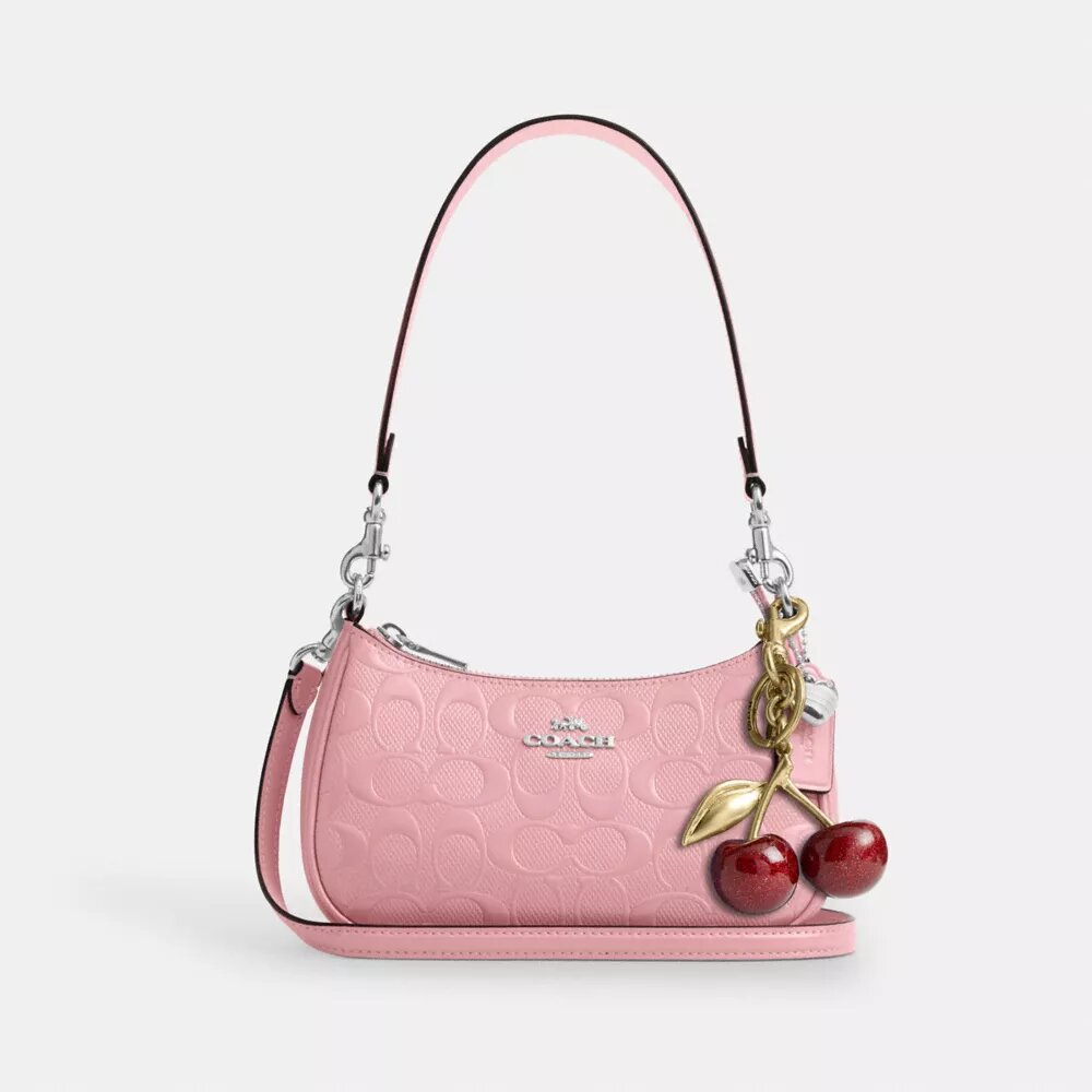 Teri Mini-crossbody-taske i signaturlæder med hjertevedhæng