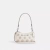 Teri Mini-crossbody-taske med blomsterapplikation
