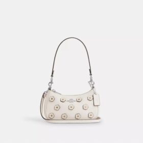 Teri Mini-crossbody-taske med blomsterapplikation