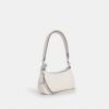 Teri Mini-crossbody-taske med blomsterapplikation