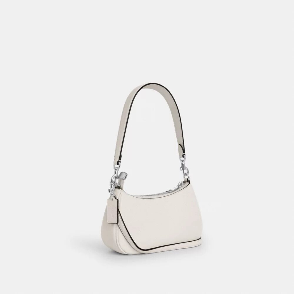 Teri Mini-crossbody-taske med blomsterapplikation