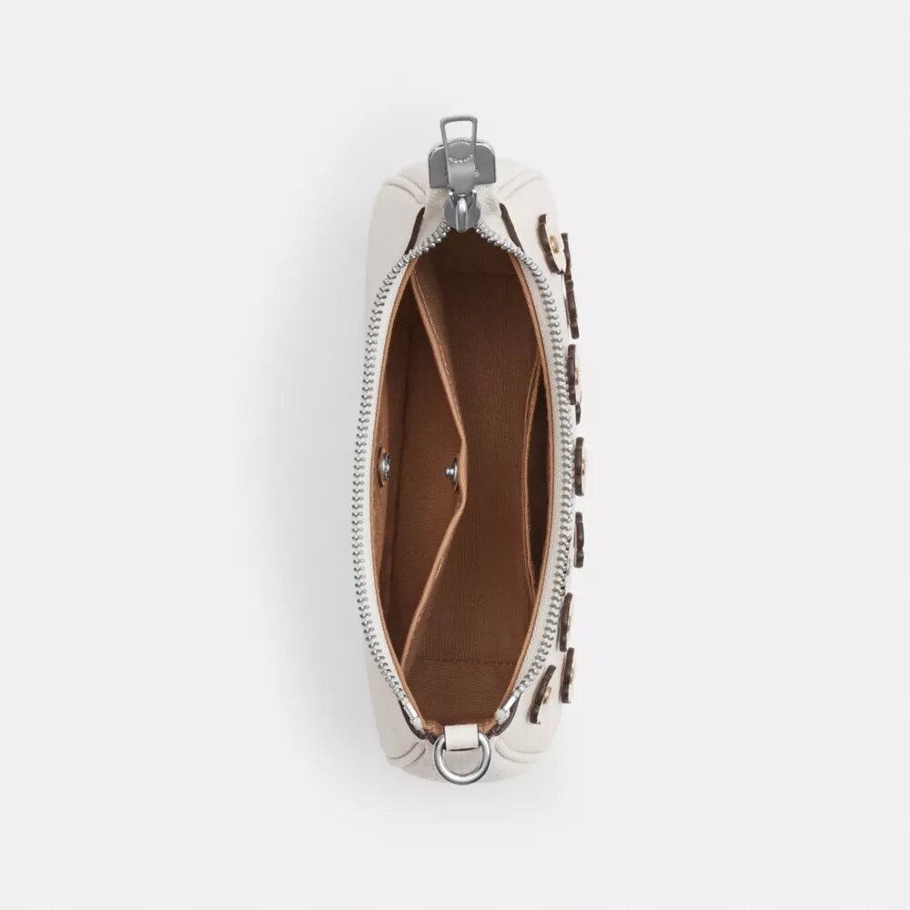 Teri Mini-crossbody-taske med blomsterapplikation