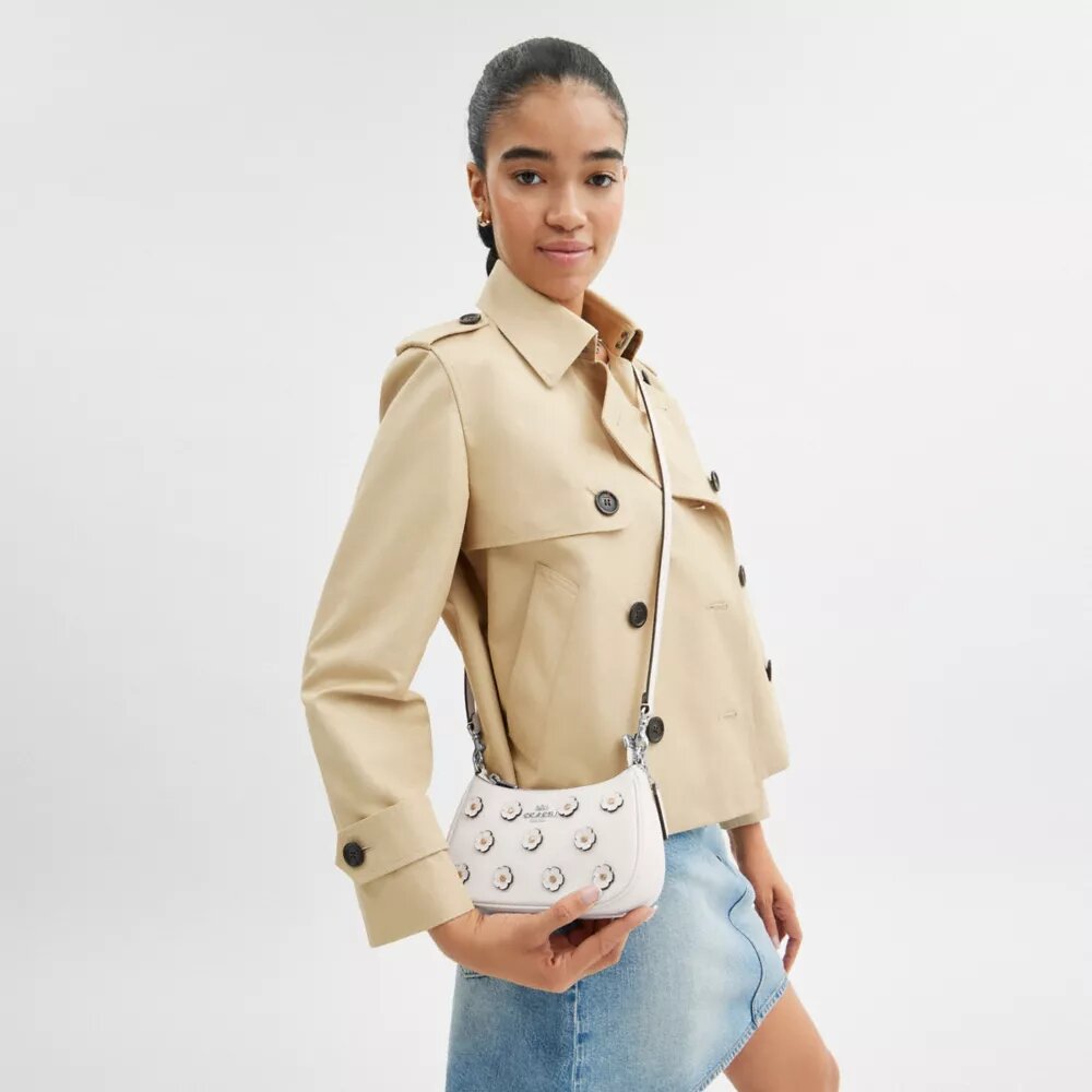 Teri Mini-crossbody-taske med blomsterapplikation