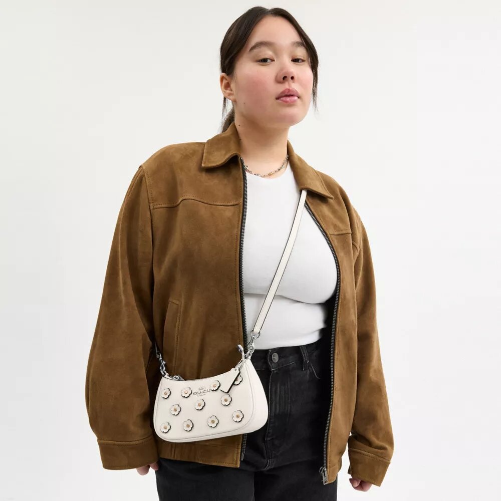 Teri Mini-crossbody-taske med blomsterapplikation