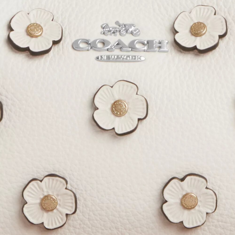 Teri Mini-crossbody-taske med blomsterapplikation