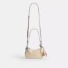 Teri Mini-crossbody-taske med vedhæng