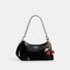 Teri skuldertaske med lomme