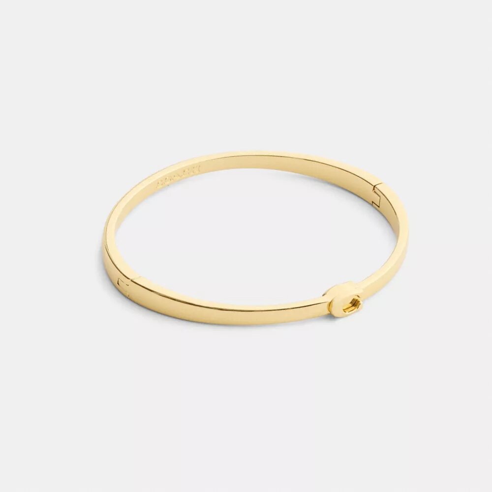 Tynd armring med hængsel i vores signaturdesign
