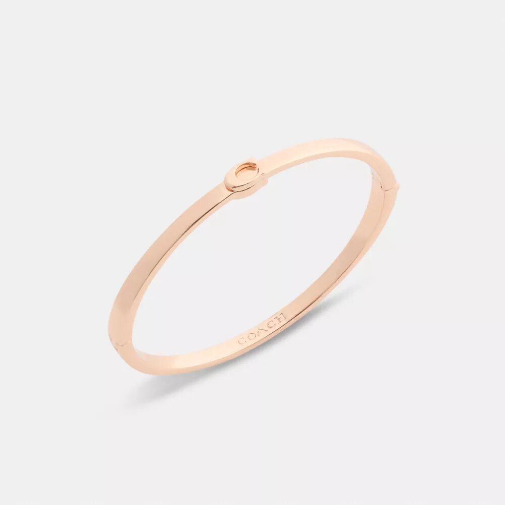 Tynd armring med hængsel i vores signaturdesign