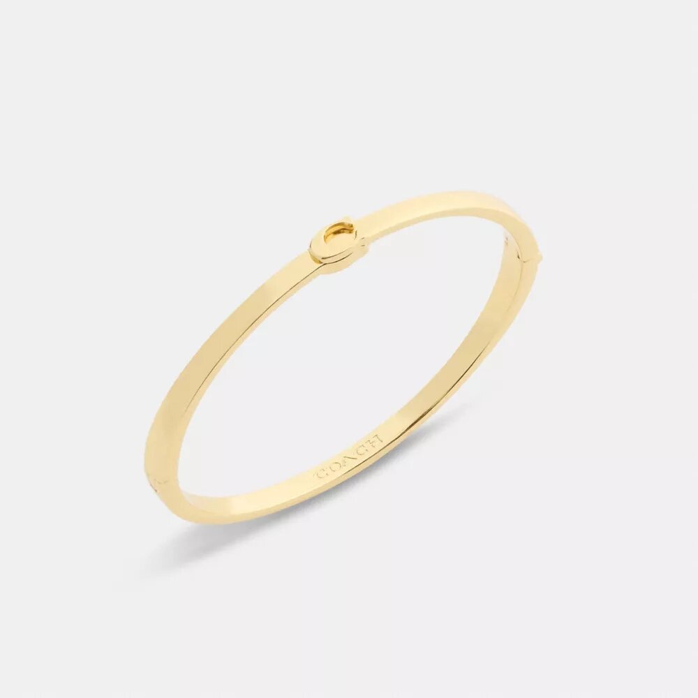 Tynd armring med hængsel i vores signaturdesign